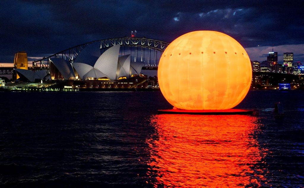 Supplied image of the Handa Opera on Sydney Harbour: Madama Butterfly sun-shaped stage during its reveal on Sydney Harbour, Wednesday, March 12, 2014. The production opens on 21 March and plays until 12 April. (AAP Image/Opera Australia, James Morgan) NO ARCHIVING, EDITORIAL USE ONLY Supplied image of the Handa Opera on Sydney Harbour: Madama Butterfly sun-shaped stage during its reveal on Sydney Harbour, Wednesday, March 12, 2014. The production opens on 21 March and plays until 12 April. (AAP Image/Opera Australia, James Morgan) NO ARCHIVING, EDITORIAL USE ONLY